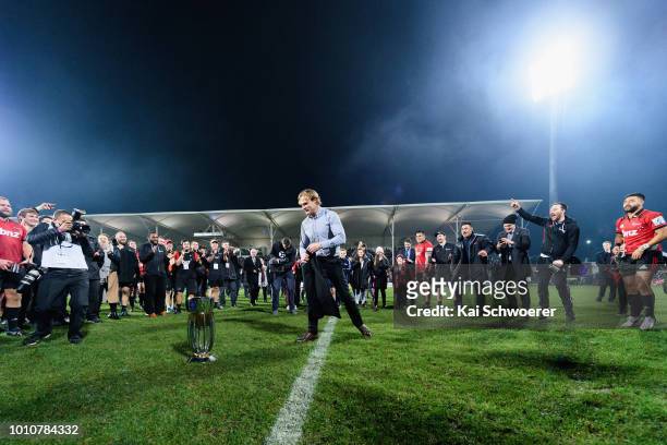 Head Coach Scott Robertson of the Crusaders makes a break dance after the win in the Super Rugby Final match between the Crusaders and the Lions at...