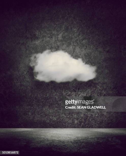 single cloud floating inside room - great depression stock-fotos und bilder