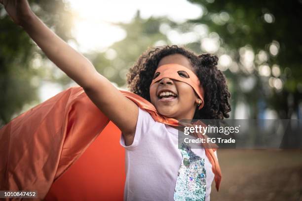 super hero little cute girl - female superhero costumes stock pictures, royalty-free photos & images
