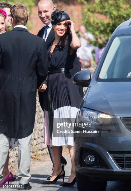 Meghan, Duchess of Sussex attends the wedding of Charlie Van Straubenzee on August 4, 2018 in Frensham, United Kingdom. Prince Harry attended the...