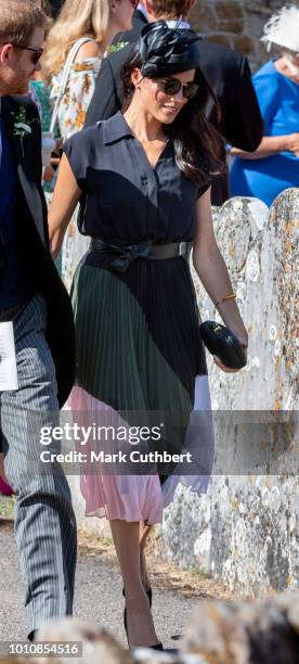 Meghan, Duchess of Sussex attends the wedding of Charlie Van Straubenzee and Daisy Jenks on August 4, 2018 in Frensham, United Kingdom. Prince Harry...