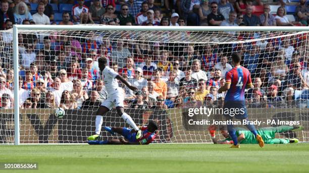 Toulouse's Aaron Leya Iseka scores the opening goal during the pre-season friendly match at Selhurst Park, London.