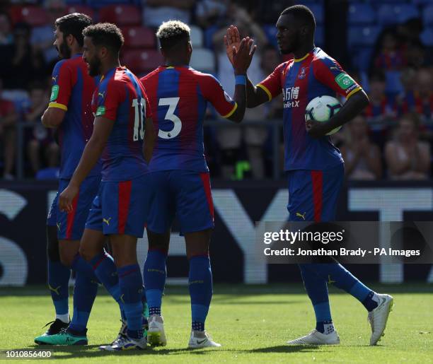 Crystal Palace's Christian Benteke is congratulated by team mates after scoring during the pre-season friendly match at Selhurst Park, London.