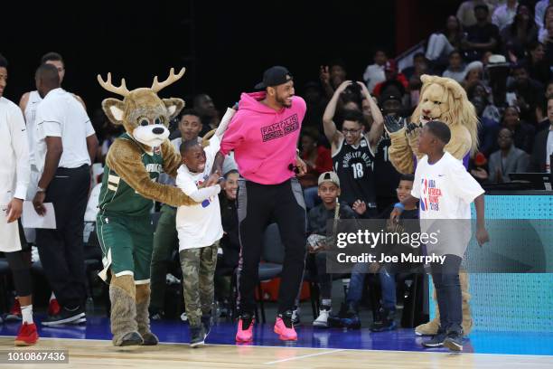 Carmelo Anthony addresses the crowd during the 2018 NBA Africa Game as part of the Basketball Without Borders Africa on August 4, 2018 at the Time...