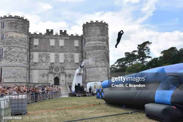 Rodrigo Perez gets fired from a Human Cannonball during Day 3 of Bestival 2018 at Lulworth Estate on August 4, 2018 in Lulworth Camp, England.