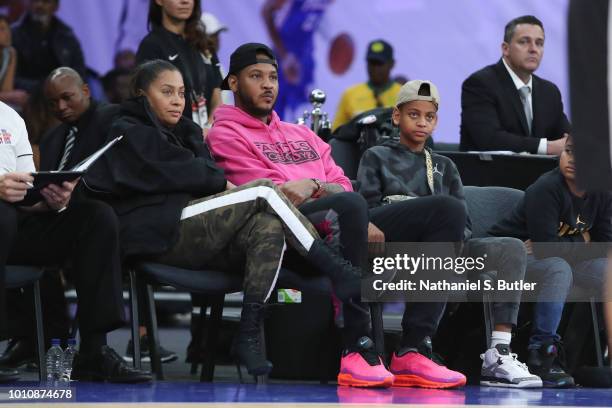 La La Anthony, Carmelo Anthony, and Kiyan Carmelo Anthony attend the 2018 NBA Africa Game as part of the Basketball Without Borders Africa on August...