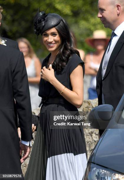 Meghan, Duchess of Sussex attends the wedding of Daisy Jenks and Charlie Van Straubenzee at Saint Mary The Virgin Church on August 4, 2018 in...