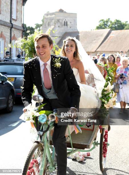 Daisy Jenks and Charlie Van Straubenzee depart after getting married at Saint Mary The Virgin Church on August 4, 2018 in Frensham, United Kingdom....