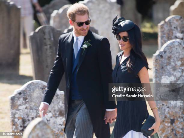 Prince Harry, Duke of Sussex and Meghan, Duchess of Sussex attends the wedding of Charlie Van Straubenzee on August 4, 2018 in Frensham, United...