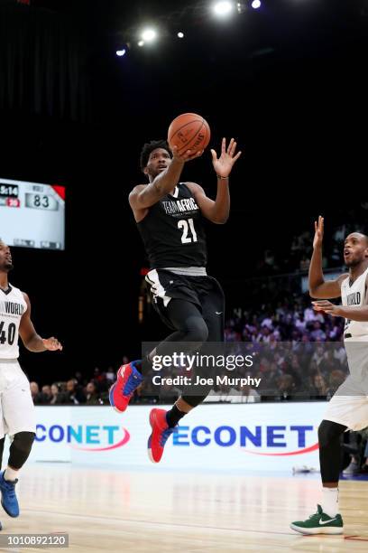 Joel Embiid of Team Africa goes to the basket against Team World during the 2018 NBA Africa Game as part of the Basketball Without Borders Africa on...