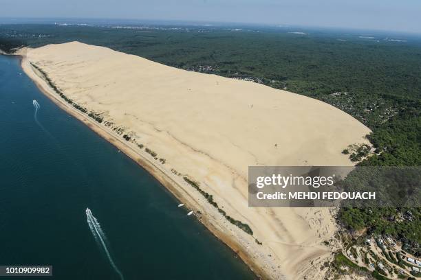 This aerial view shows the shores of the bassin d'Arcachon and the Pilat sand dune on August 4, 2018 in Arcachon, southwestern France.