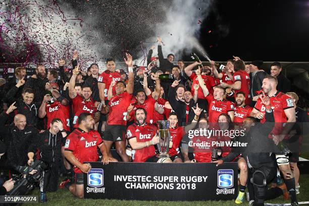 The Crusaders celebrate with the Super Rugby Trophy following the Super Rugby Final match between the Crusaders and the Lions at AMI Stadium on...