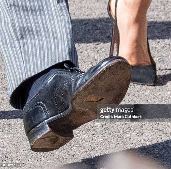 Prince Harry, Duke of Sussex, is seen with a hole in his shoe attends the wedding of Charlie Van Straubenzee and Daisy Jenks on August 4, 2018 in...