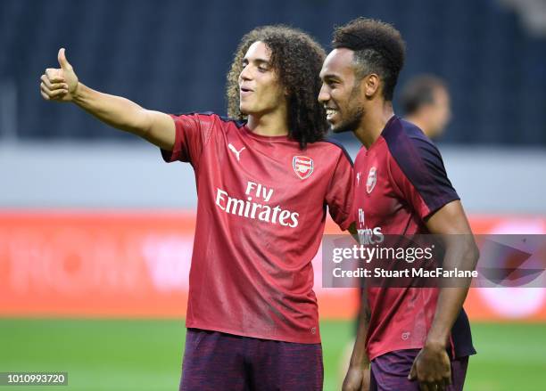 Matteo Guendouzi and Pierre-Emerick Aubameyang of Arsenal during the Pre-season friendly between Arsenal and SS Lazio on August 4, 2018 in Stockholm,...