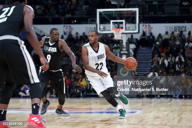 Khris Middleton of Team World handles the ball against Team Africa during the 2018 NBA Africa Game as part of the Basketball Without Borders Africa...