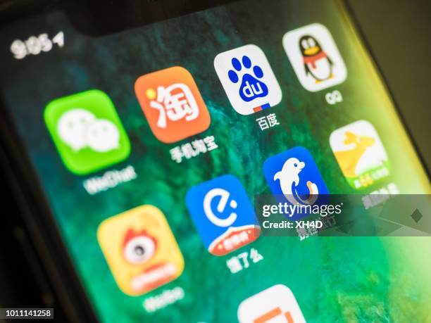 chinese social media with iphone x - wechat china stock pictures, royalty-free photos & images