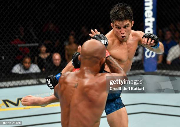 Henry Cejudo kicks Demetrious Johnson in their UFC flyweight championship fight during the UFC 227 event inside Staples Center on August 4, 2018 in...