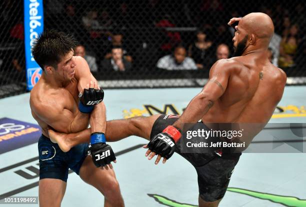 Demetrious Johnson kicks Henry Cejudo in their UFC flyweight championship fight during the UFC 227 event inside Staples Center on August 4, 2018 in...