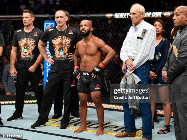 Demetrious Johnson reacts after his split-decision loss to Henry Cejudo in their UFC flyweight championship fight during the UFC 227 event inside...