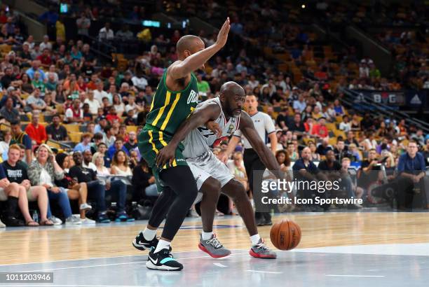 Dion Glover of Trilogy and Andre Owens of Ball Hogs during week 7 of the BIG3 basketball league on August 3 at TD Garden in Boston, MA. Trilogy won...