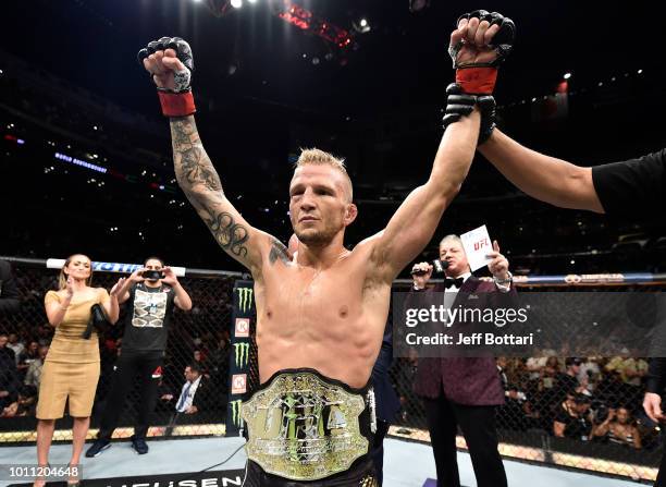 Dillashaw celebrates after his knockout victory over Cody Garbrandt in their UFC bantamweight championship fight during the UFC 227 event inside...