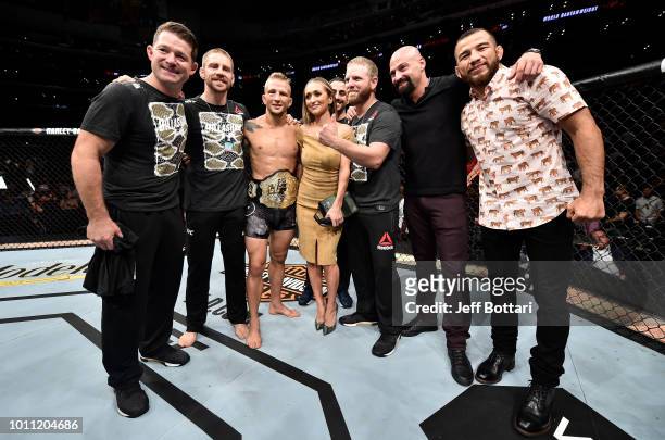 Dillashaw celebrates after his knockout victory over Cody Garbrandt in their UFC bantamweight championship fight during the UFC 227 event inside...