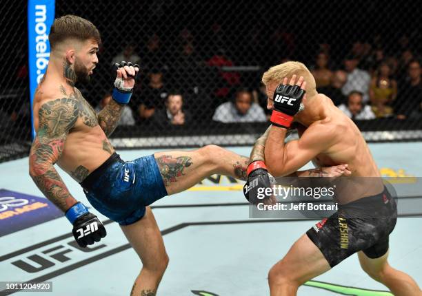 Cody Garbrandt kicks TJ Dillashaw in their UFC bantamweight championship fight during the UFC 227 event inside Staples Center on August 4, 2018 in...