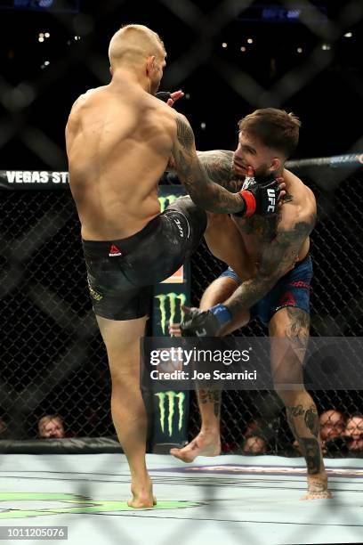 Dillashaw kicks Cody Garbrandt in the first round of the UFC Bantamweight Title Bout during UFC 227 at Staples Center on August 4, 2018 in Los...