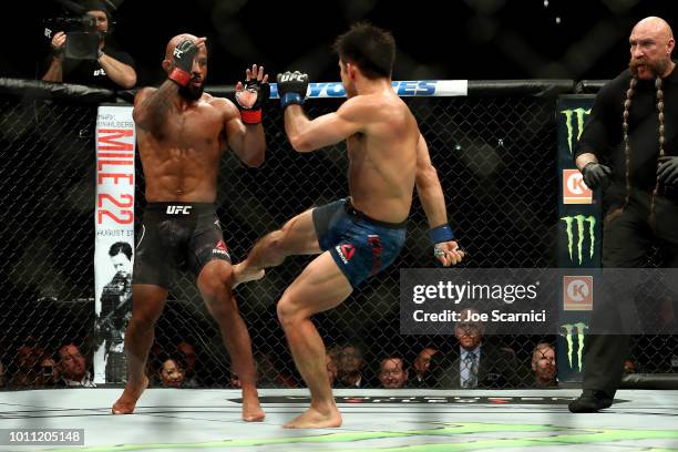 Henry Cejudo kicks Demetrious Johnson in the shin in the third round of the UFC Flyweight Title Bout during UFC 227 at Staples Center on August 4,...