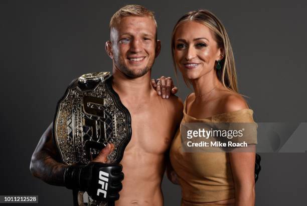 Dillashaw poses for a portrait backstage with wife Rebecca after his victory over Cody Garbrandt during the UFC 227 event inside Staples Center on...