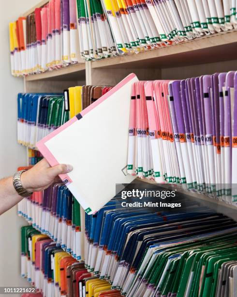 Man Hand File Folder 102 Hand File Cabinet Stock Photos, High-Res Pictures, and Images ...