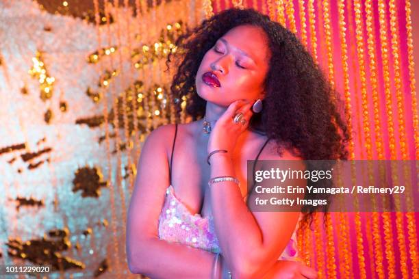 Beauty Portrait of Young Confident Woman with Curly Hair