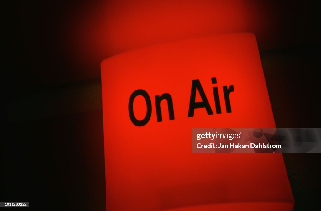 Red light sign outside the TV studio with the text On Air