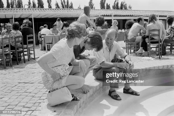 Singer Mick Jagger of The Rolling Stones, with his parents, Eva and Joe, in St Tropez, France, for Mick's wedding to Bianca Pérez-Mora Macías, 12th...