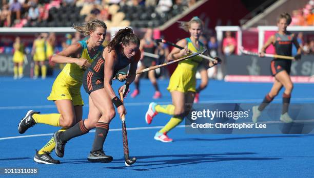 Lidewij Welten of Netherlands battles with Kaitlin Nobbs of Australia during the Semi-Final game between Netherlands and Australia of the FIH Womens...