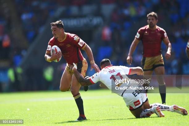 Tony Gigot of Catalans Dragons in action during the Ladbrokes Challenge Cup Semi Final match between St Helens and Catalans Dragons at Macron Stadium...