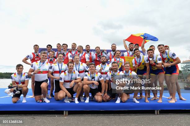 The Germany , Netherlands and Romania teams are presented with their medals for the Men's Eight during the rowing on Day Four of the European...