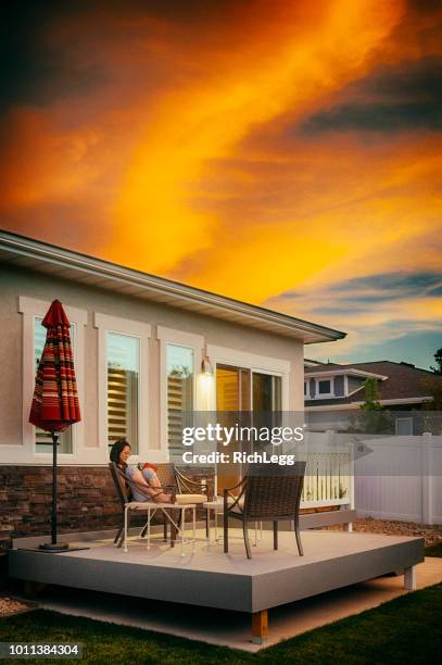 backyard home at sunset - new deck stock pictures, royalty-free photos & images