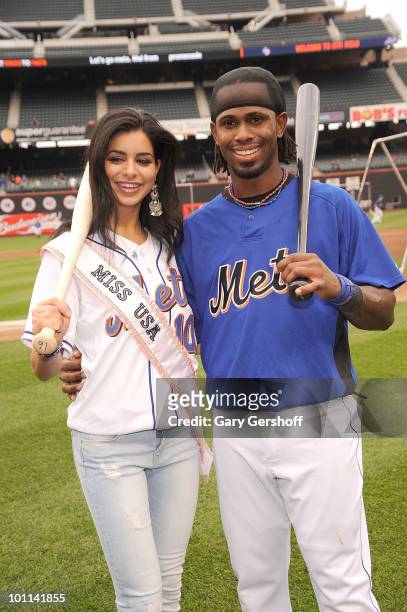 Miss USA Rima Fakih poses for pictures with N.Y Met's Jose Reyes at Citi Field on May 27, 2010 in the Queens Borough of New York City.