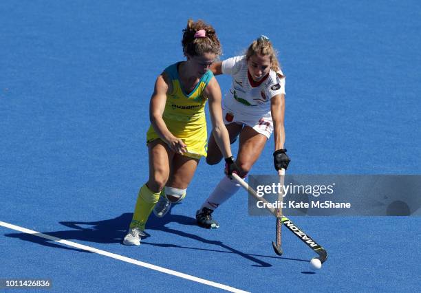 Ambrosia Malone of Australia and Cristina Guinea of Spain battle for the ball during the FIH Womens Hockey World Cup Third Place Play Off game...