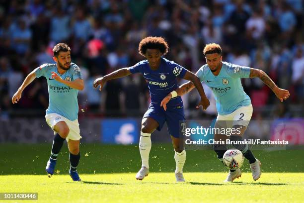 Kyle Walker of Manchester City and Willian of Chelsea battle for the ball during the FA Community Shield match between Manchester City and Chelsea at...