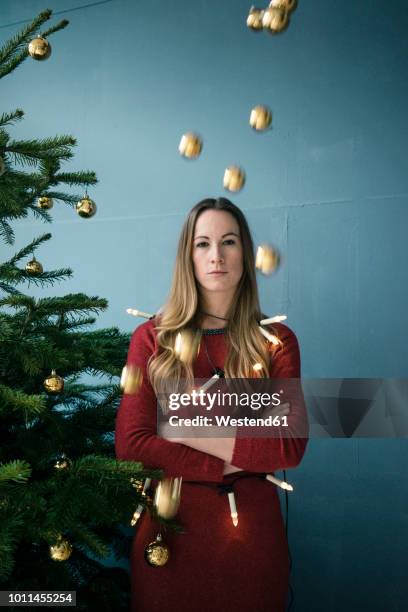 portrait of annoyed woman at christmas time - christmas angry stock pictures, royalty-free photos & images