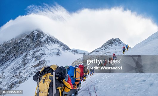 Nepal, Solo Khumbu, Everest, Sagamartha National Park, Roped team ascending, wearing oxigen masks Nepal, Solo Khumbu, Everest, Sagamartha National Park, Roped team ascending, wearing oxigen masks