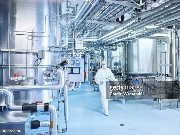 chemist in a chemical factory - chemical foto e immagini stock