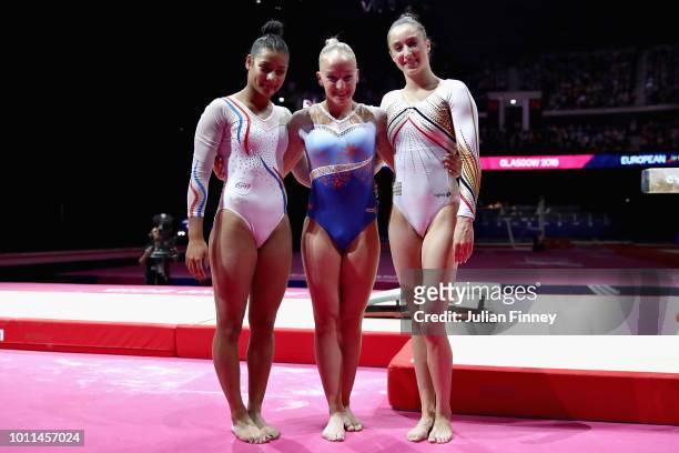 Sanne Wevers of Netherlands , Nina Derwael of Belgium and Marine Boyer of France pose for a photo after the Women's Individual Balance Beam Final...