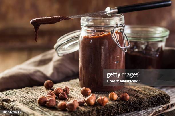 glass of homemade chocolate spread - chocolate spread stock pictures, royalty-free photos & images