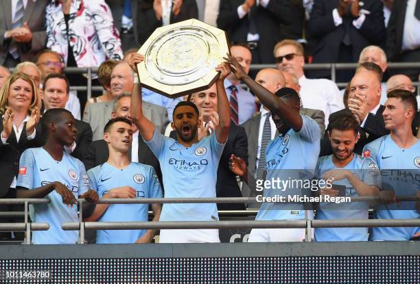 Riyad Mahrez of Manchester City lifts the Community Shield Trophy following his side's victory during the FA Community Shield between Manchester City...