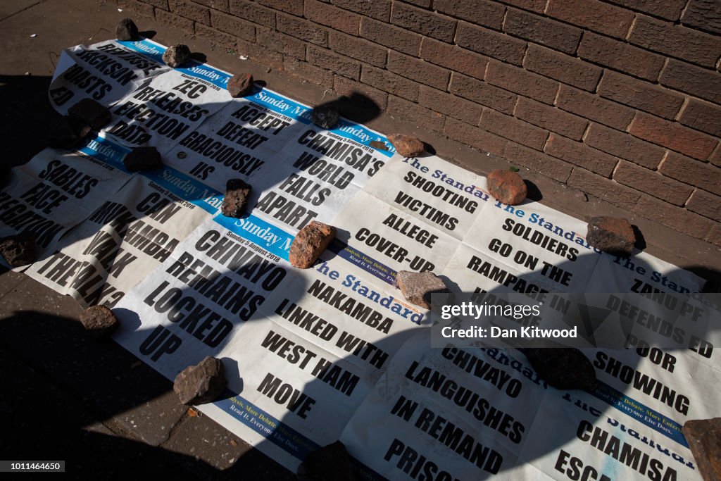 Newspaper headlines are seen on August 05, 2018 in Harare, Zimbabwe