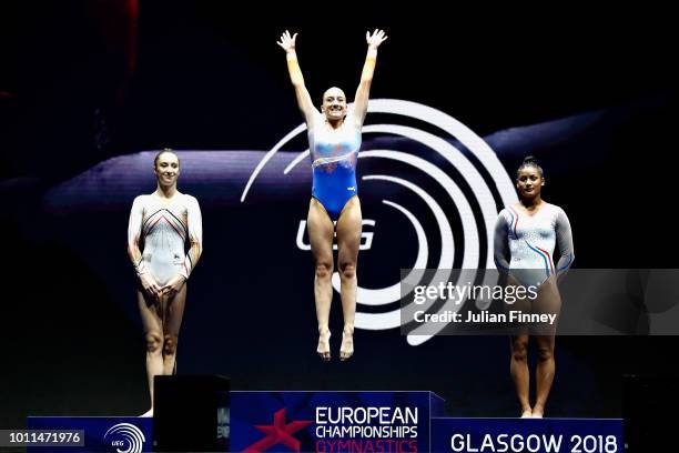 Sanne Wevers of Netherlands , Nina Derwael of Belgium and Marine Boyer of France are presented with their medals in the Women's Individual Balance...