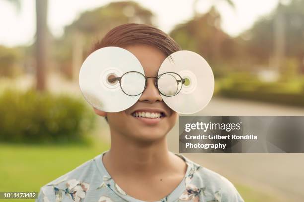 young man wearing cd glasses - asian crazy stock pictures, royalty-free photos & images